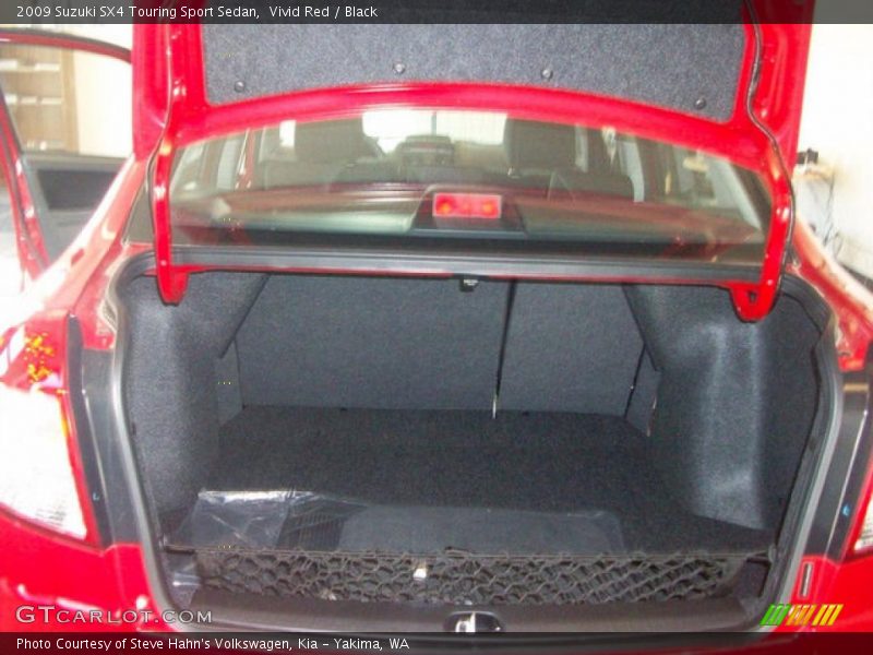 Vivid Red / Black 2009 Suzuki SX4 Touring Sport Sedan