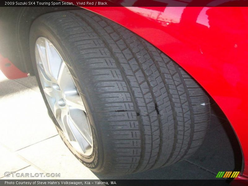 Vivid Red / Black 2009 Suzuki SX4 Touring Sport Sedan