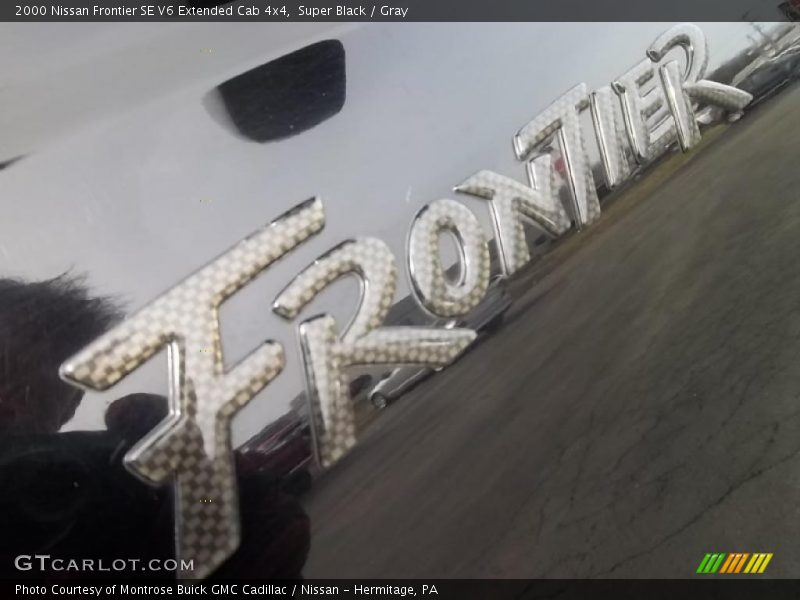  2000 Frontier SE V6 Extended Cab 4x4 Logo