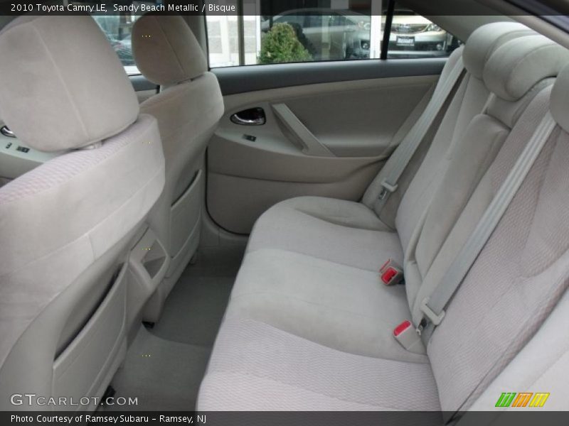 Sandy Beach Metallic / Bisque 2010 Toyota Camry LE