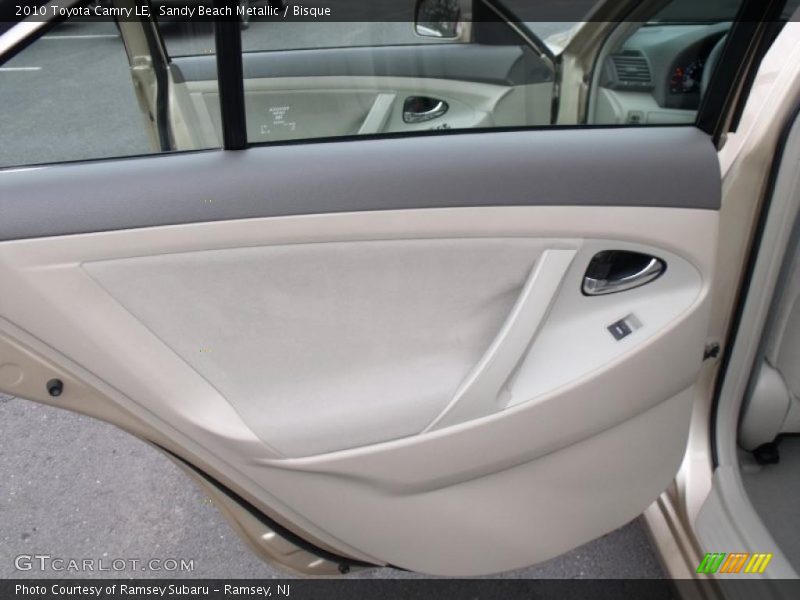 Sandy Beach Metallic / Bisque 2010 Toyota Camry LE