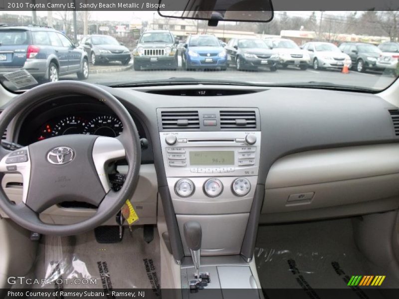Sandy Beach Metallic / Bisque 2010 Toyota Camry LE