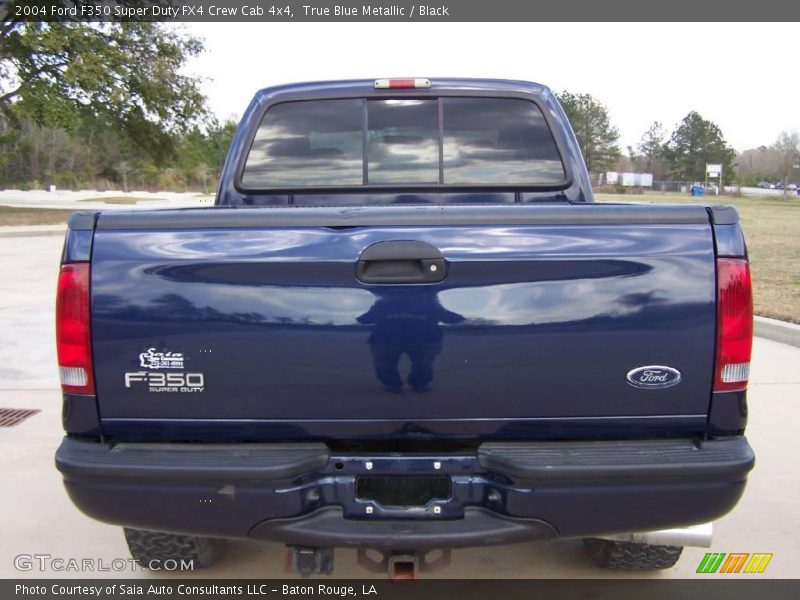 True Blue Metallic / Black 2004 Ford F350 Super Duty FX4 Crew Cab 4x4