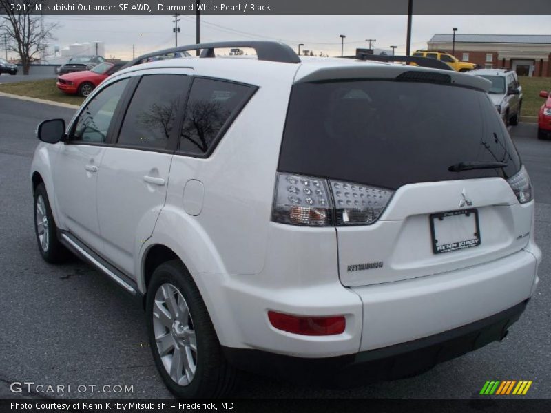 Diamond White Pearl / Black 2011 Mitsubishi Outlander SE AWD