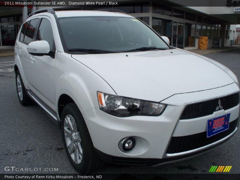 Diamond White Pearl / Black 2011 Mitsubishi Outlander SE AWD