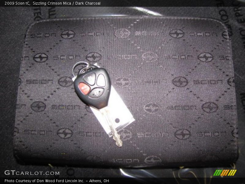 Sizzling Crimson Mica / Dark Charcoal 2009 Scion tC