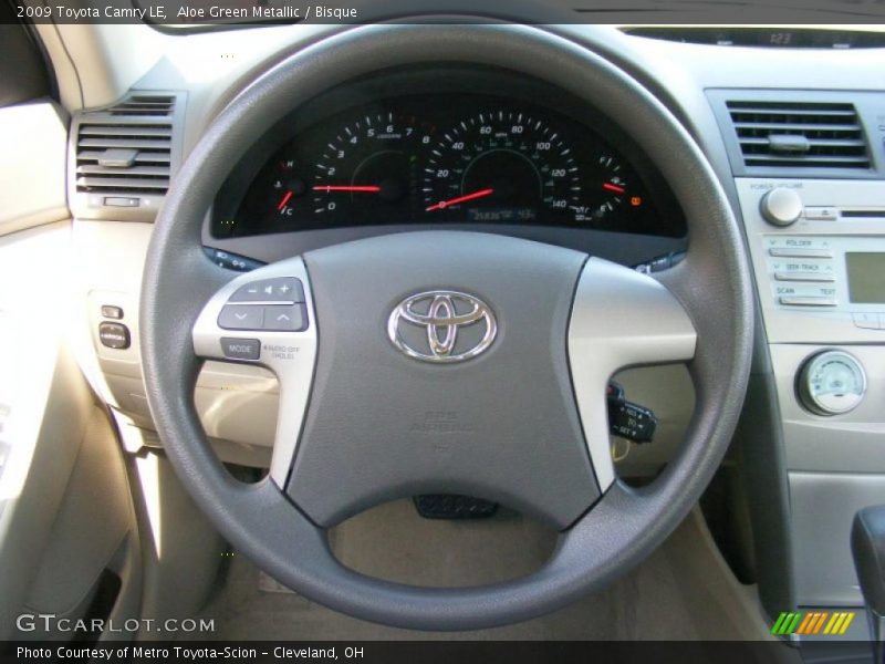 Aloe Green Metallic / Bisque 2009 Toyota Camry LE