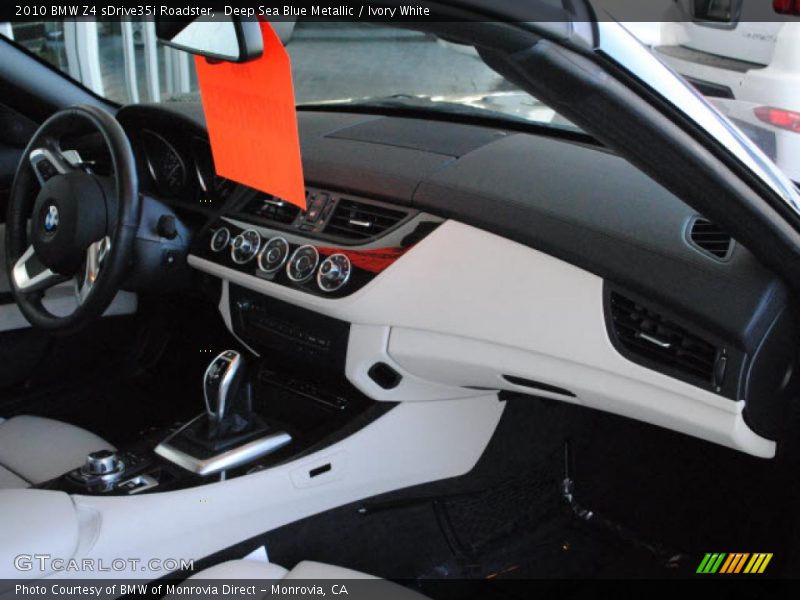 Deep Sea Blue Metallic / Ivory White 2010 BMW Z4 sDrive35i Roadster