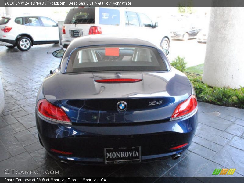 Deep Sea Blue Metallic / Ivory White 2010 BMW Z4 sDrive35i Roadster