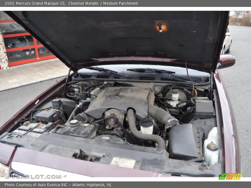 Chestnut Metallic / Medium Parchment 2002 Mercury Grand Marquis GS