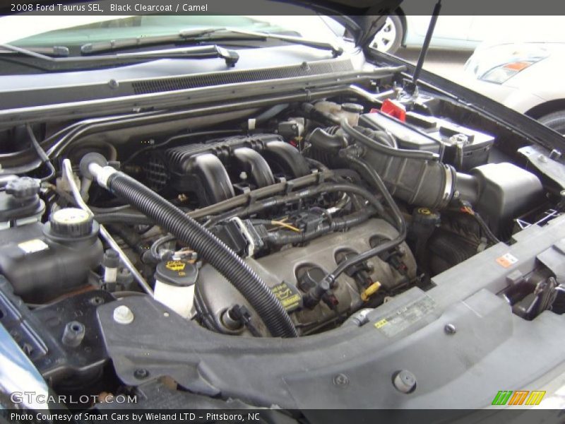 Black Clearcoat / Camel 2008 Ford Taurus SEL