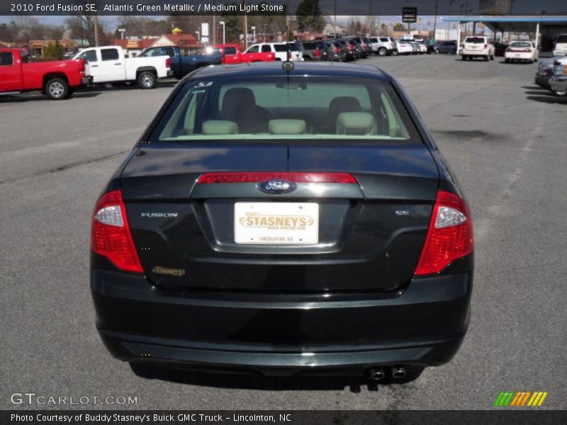Atlantis Green Metallic / Medium Light Stone 2010 Ford Fusion SE
