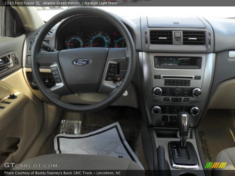 Atlantis Green Metallic / Medium Light Stone 2010 Ford Fusion SE