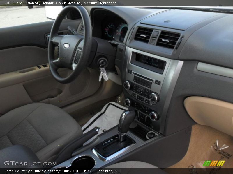 Atlantis Green Metallic / Medium Light Stone 2010 Ford Fusion SE
