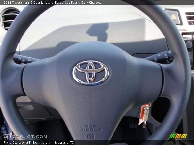 Bayou Blue Pearl / Dark Charcoal 2011 Toyota Yaris 5 Door Liftback