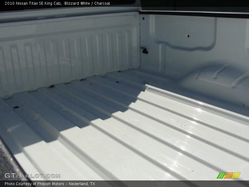 Blizzard White / Charcoal 2010 Nissan Titan SE King Cab