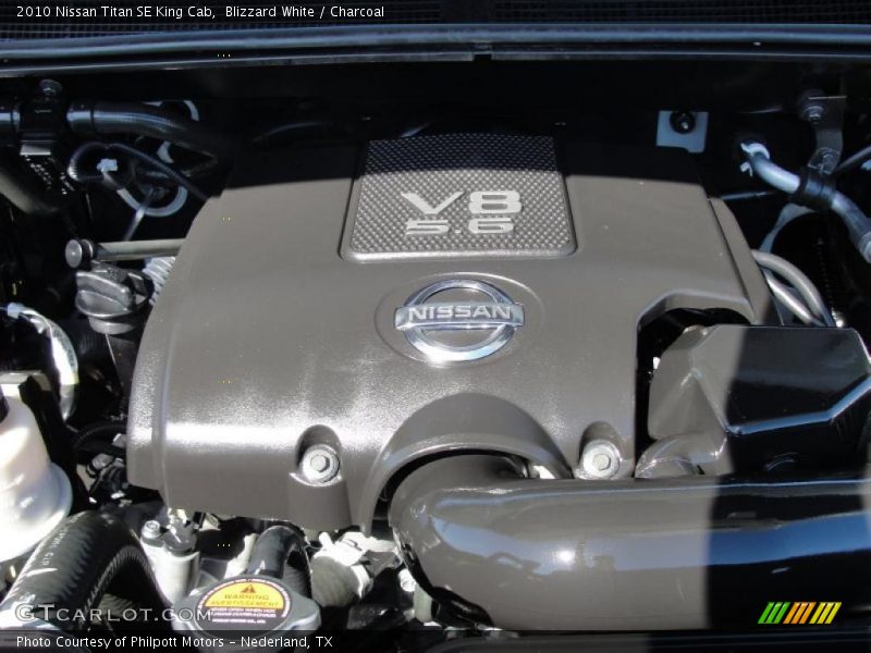 Blizzard White / Charcoal 2010 Nissan Titan SE King Cab