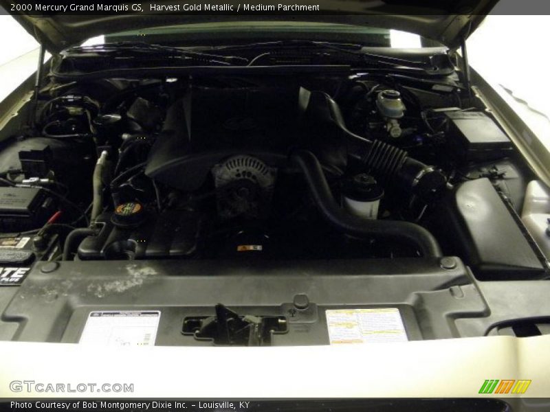 Harvest Gold Metallic / Medium Parchment 2000 Mercury Grand Marquis GS
