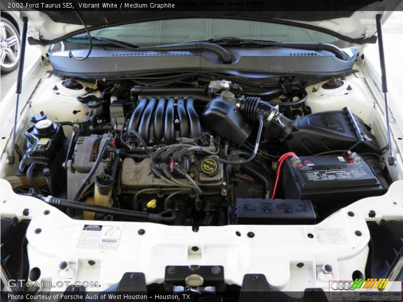 Vibrant White / Medium Graphite 2002 Ford Taurus SES