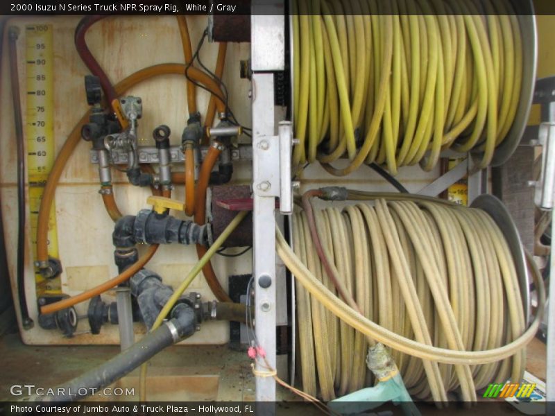 White / Gray 2000 Isuzu N Series Truck NPR Spray Rig