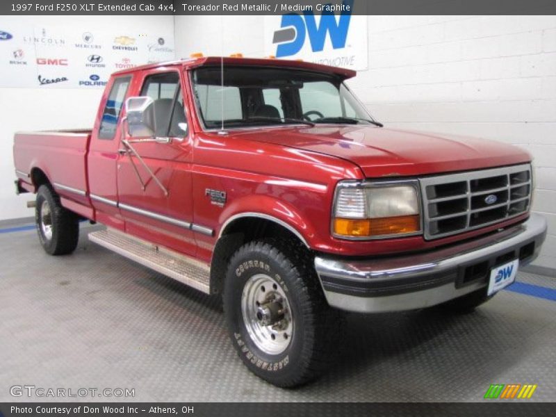 Toreador Red Metallic / Medium Graphite 1997 Ford F250 XLT Extended Cab 4x4