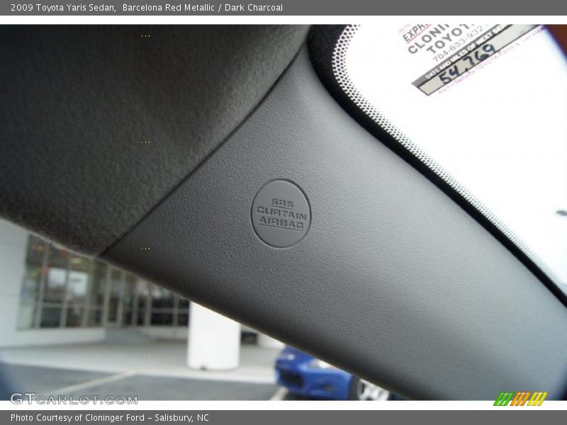 Barcelona Red Metallic / Dark Charcoal 2009 Toyota Yaris Sedan