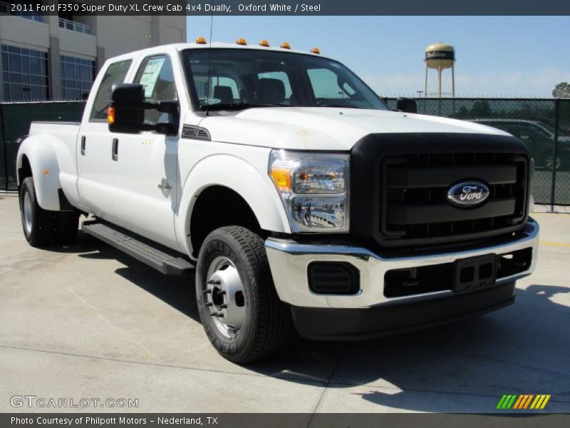 Front 3/4 View of 2011 F350 Super Duty XL Crew Cab 4x4 Dually