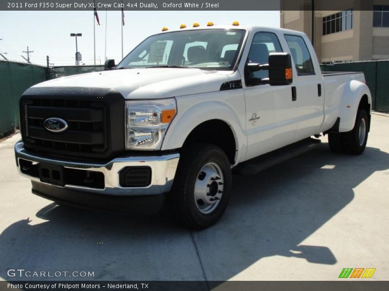Front 3/4 View of 2011 F350 Super Duty XL Crew Cab 4x4 Dually