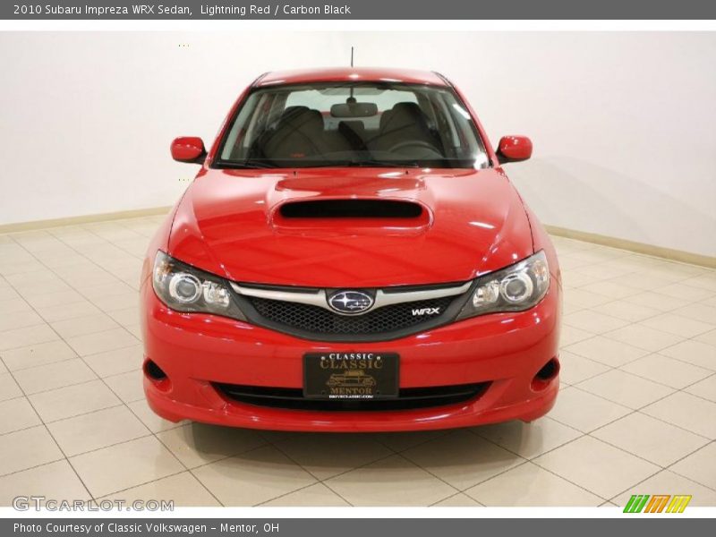 Lightning Red / Carbon Black 2010 Subaru Impreza WRX Sedan