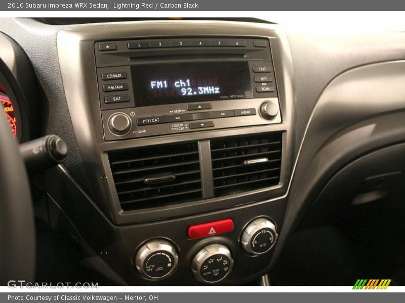 Lightning Red / Carbon Black 2010 Subaru Impreza WRX Sedan