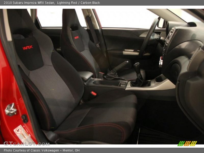 Lightning Red / Carbon Black 2010 Subaru Impreza WRX Sedan