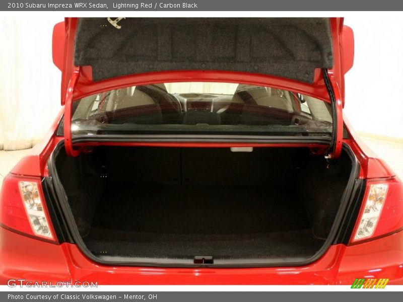 Lightning Red / Carbon Black 2010 Subaru Impreza WRX Sedan
