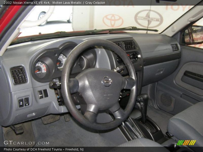 Molten Lava Metallic / Gray Celadon 2002 Nissan Xterra XE V6 4x4