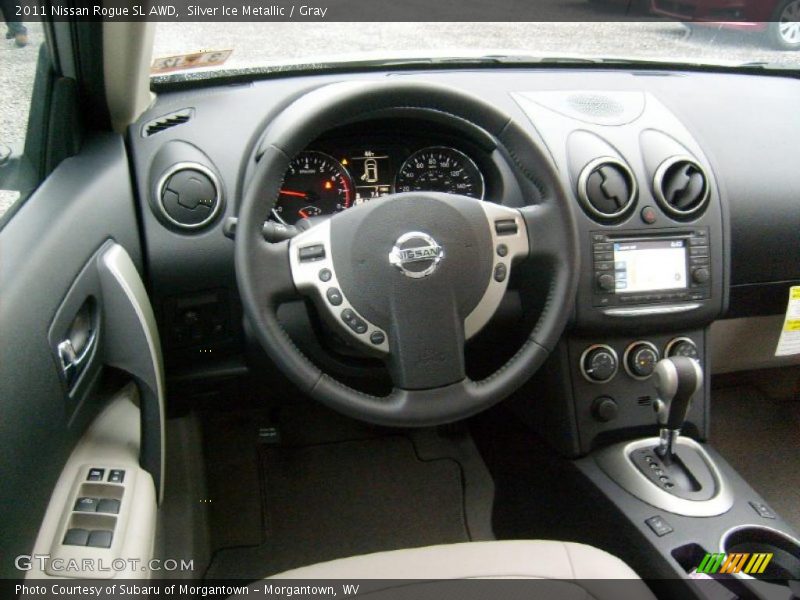 Silver Ice Metallic / Gray 2011 Nissan Rogue SL AWD