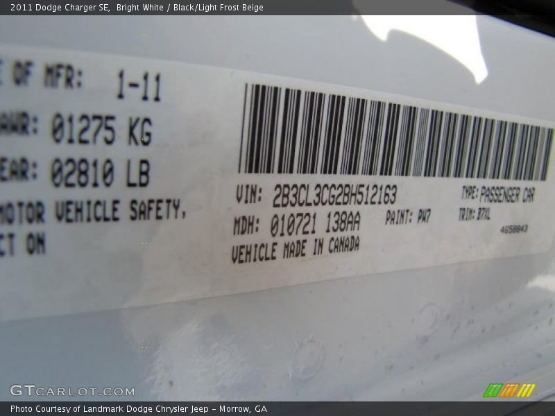 Bright White / Black/Light Frost Beige 2011 Dodge Charger SE