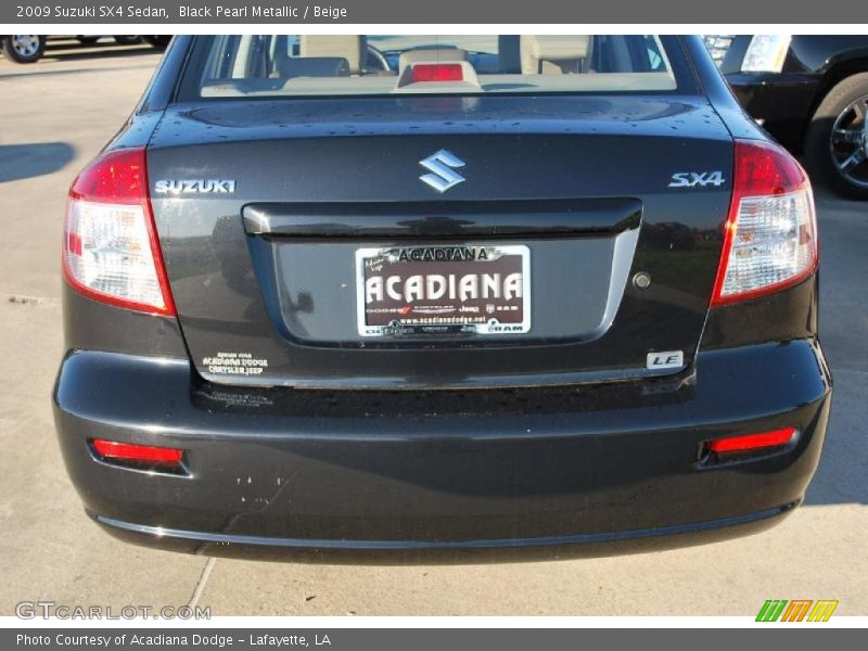 Black Pearl Metallic / Beige 2009 Suzuki SX4 Sedan