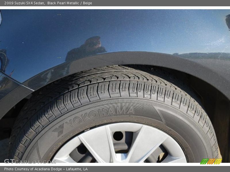 Black Pearl Metallic / Beige 2009 Suzuki SX4 Sedan