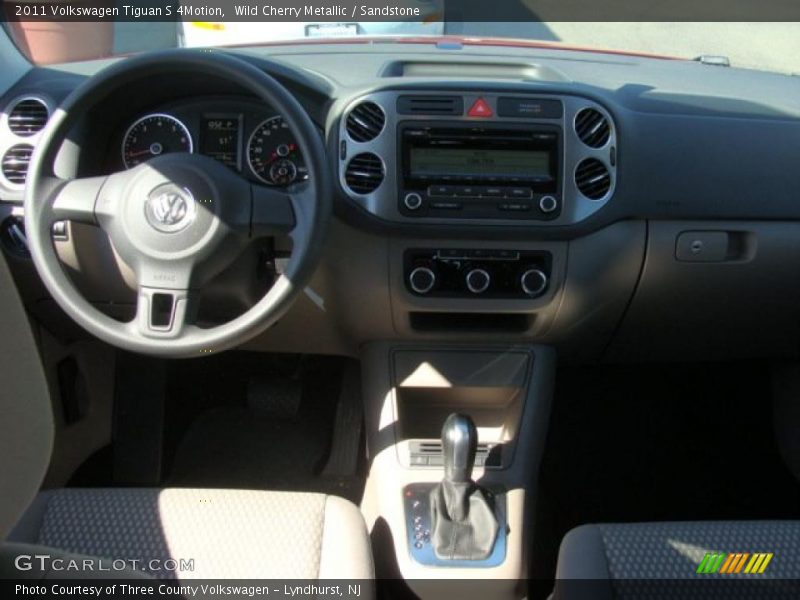 Wild Cherry Metallic / Sandstone 2011 Volkswagen Tiguan S 4Motion