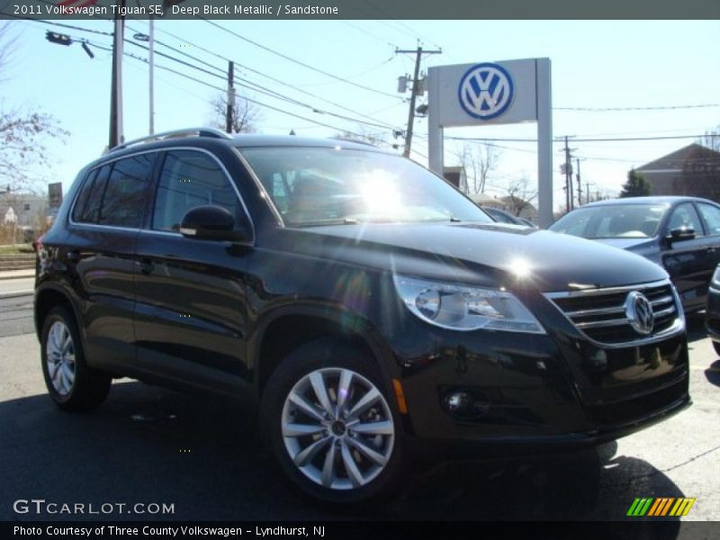 Deep Black Metallic / Sandstone 2011 Volkswagen Tiguan SE