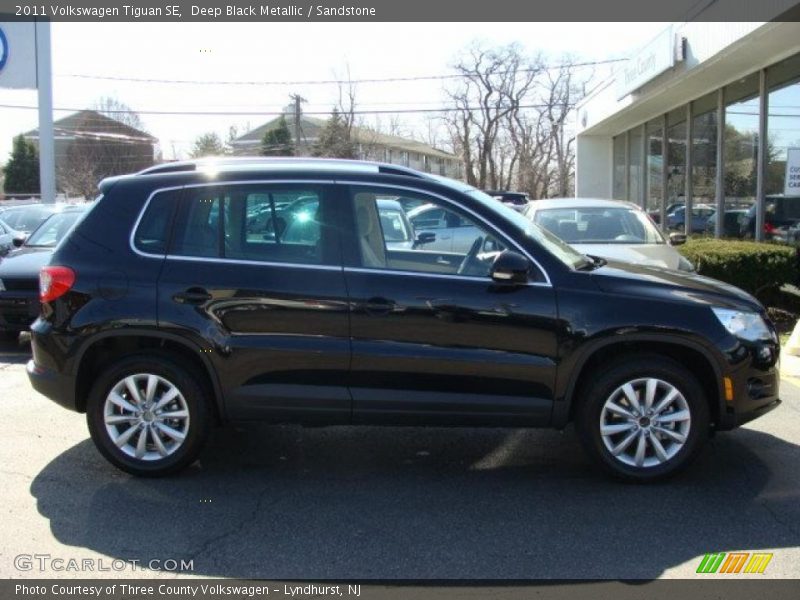 Deep Black Metallic / Sandstone 2011 Volkswagen Tiguan SE