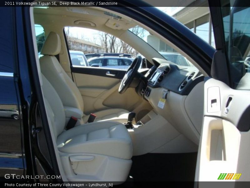 Deep Black Metallic / Sandstone 2011 Volkswagen Tiguan SE