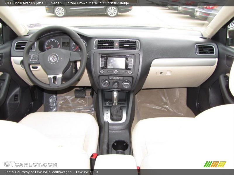 Toffee Brown Metallic / Cornsilk Beige 2011 Volkswagen Jetta SEL Sedan