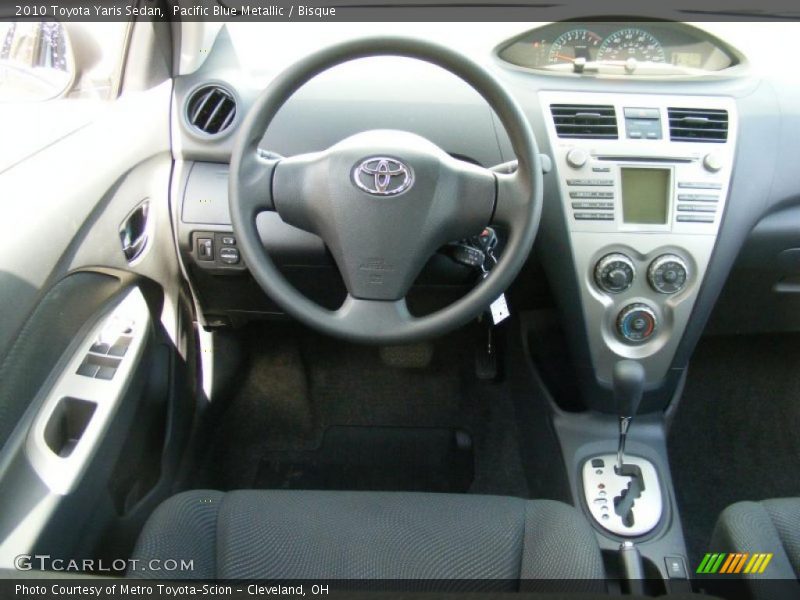 Pacific Blue Metallic / Bisque 2010 Toyota Yaris Sedan