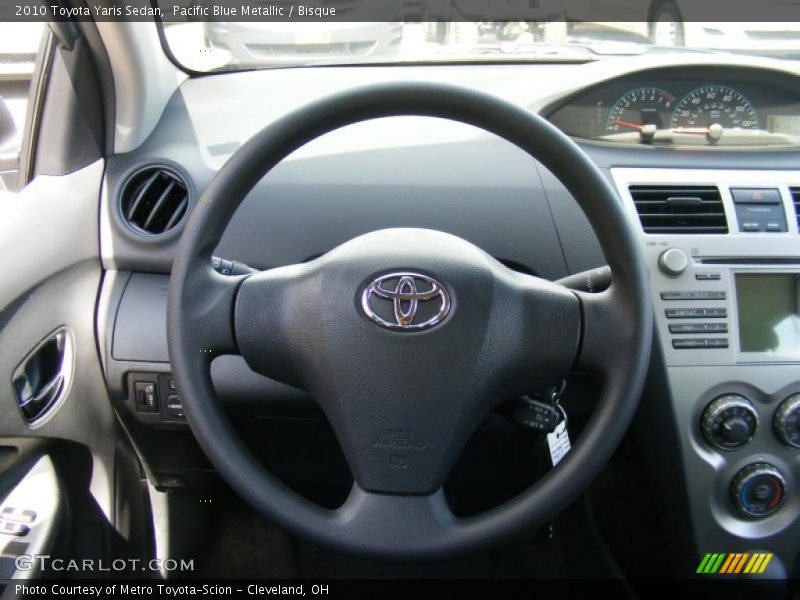 Pacific Blue Metallic / Bisque 2010 Toyota Yaris Sedan