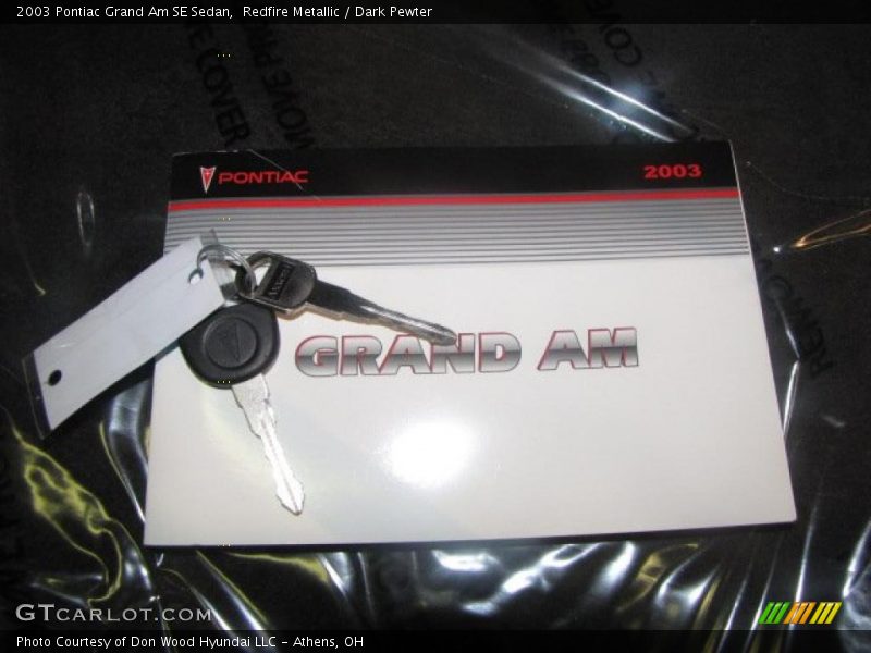 Redfire Metallic / Dark Pewter 2003 Pontiac Grand Am SE Sedan