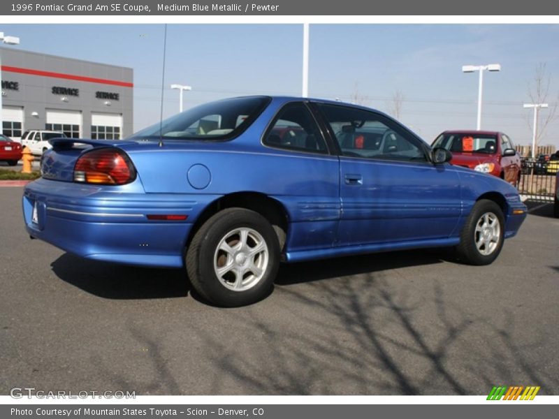 Medium Blue Metallic / Pewter 1996 Pontiac Grand Am SE Coupe
