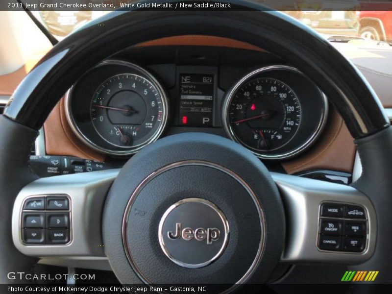 White Gold Metallic / New Saddle/Black 2011 Jeep Grand Cherokee Overland