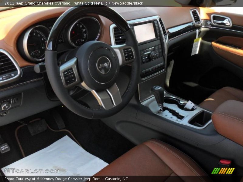 White Gold Metallic / New Saddle/Black 2011 Jeep Grand Cherokee Overland