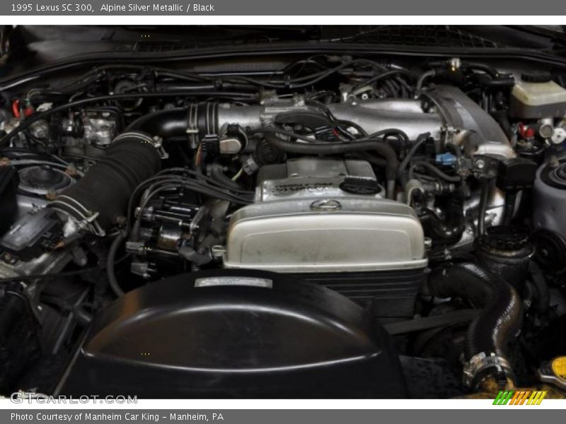 Alpine Silver Metallic / Black 1995 Lexus SC 300