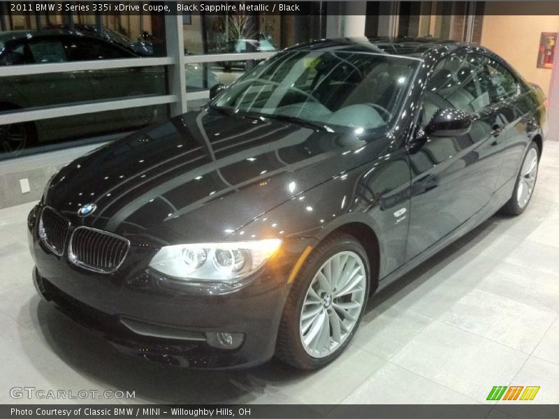 Black Sapphire Metallic / Black 2011 BMW 3 Series 335i xDrive Coupe